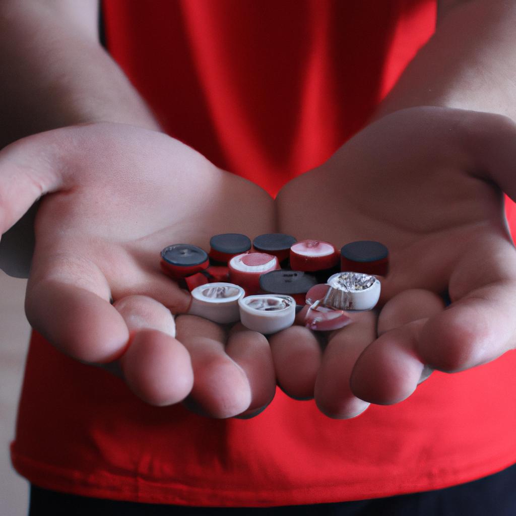 Person holding board game pieces